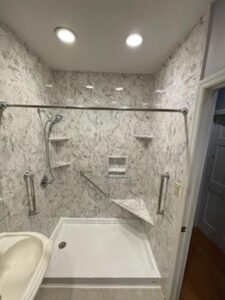 A new shower in Melville, NY after a bathroom remodeling job with Bathroom Buddy Remodeling